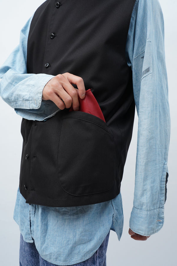 – Two pocket Asymmetrical vest –