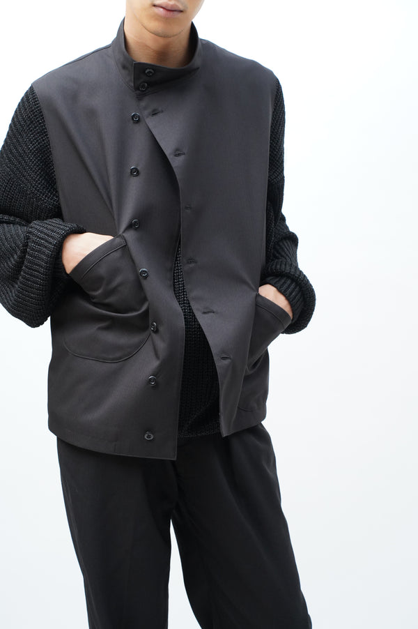 – Two pocket Asymmetrical vest –